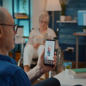 elder-adult-using-video-call-talk-doctor-about-treatment-home-senior-man-talking-specialist-about-health-care-remote-teleconference-telehealth-telemedicine_482257-39013