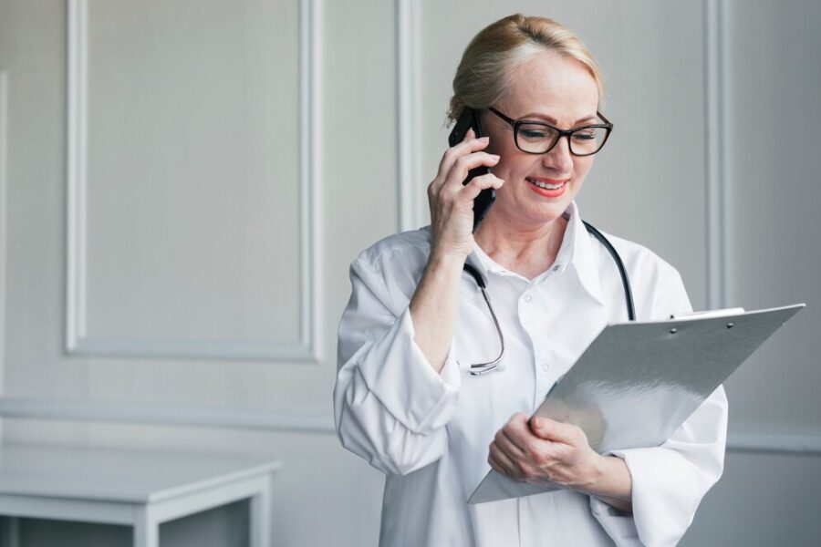 doctor-with-medical-report_23-2148168363